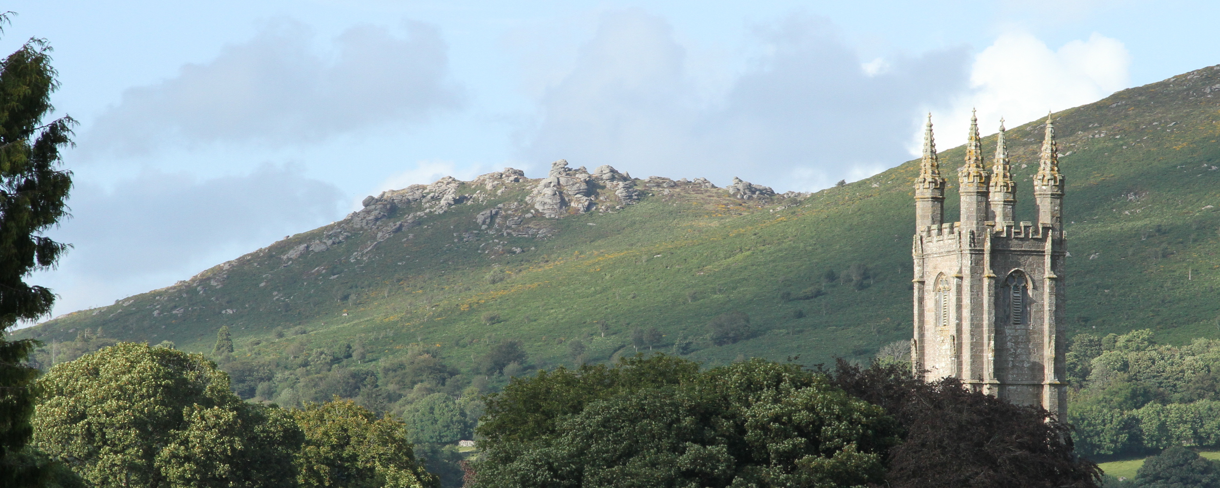 Widecombe Church Tower with Honeybag Tor in the Background
