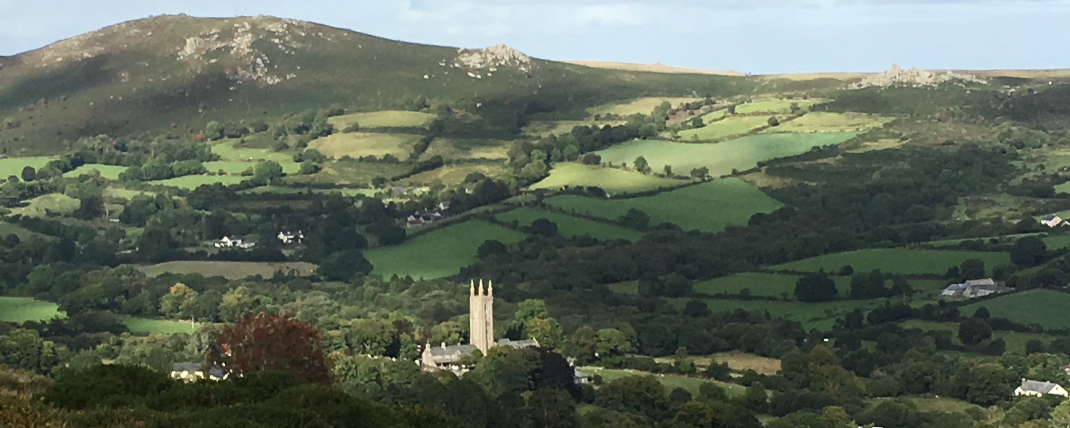 Widecombe Village with Chinkwell Tor, Bel Tor and Bonehill Rocks in the Background